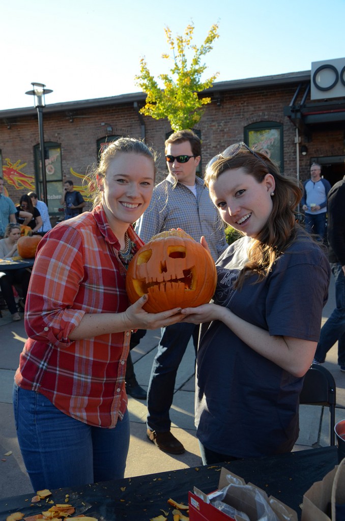 Showing off their pumpkin